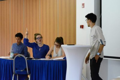 Das aktuelle Team Germany in einer Debatte der World Schools Debating Academy in Kranjska Gora, Slowenien. © Anastazija Stupar