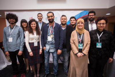 The top 10 speakers of the English track with Firas Mansouri in the middle. - © YAV